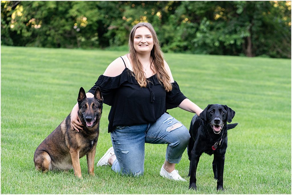 senior girl with her dogs